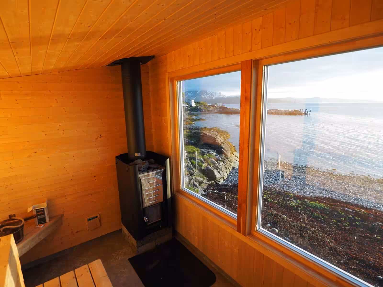 Wood-fired sauna with fjord view