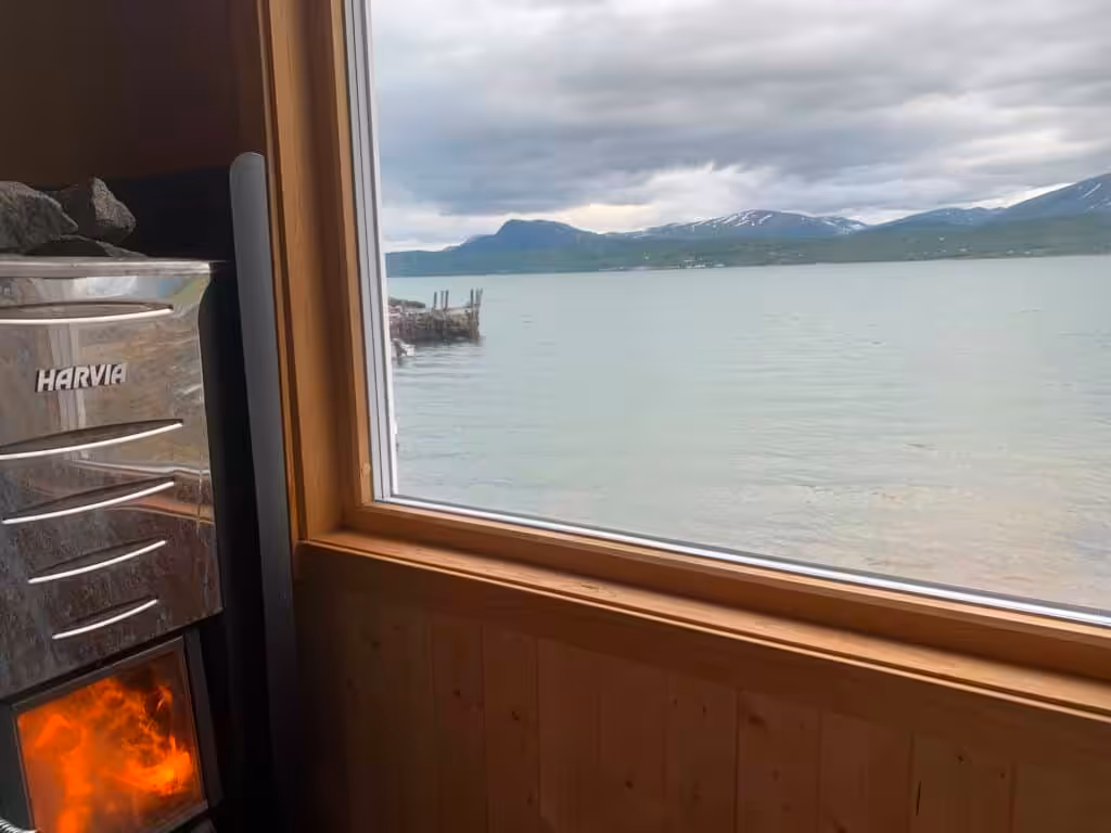 Sauna with a view of the fjord and mountains.